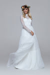 romantic boho wedding dress. Lace top with turtle neck and closed back with drop split. Layered silk chiffon skirt.