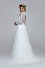 romantic boho wedding dress. Lace top with turtle neck and closed back with drop split. Layered silk chiffon skirt.