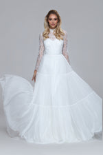 romantic boho wedding dress. Lace top with turtle neck and closed back with drop split. Layered silk chiffon skirt.