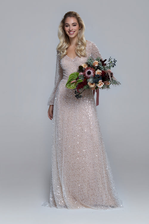 Luxurious wedding dress PASSION. Sequin tulle bridal dress with V-neckline. A-line big volume skirt. 