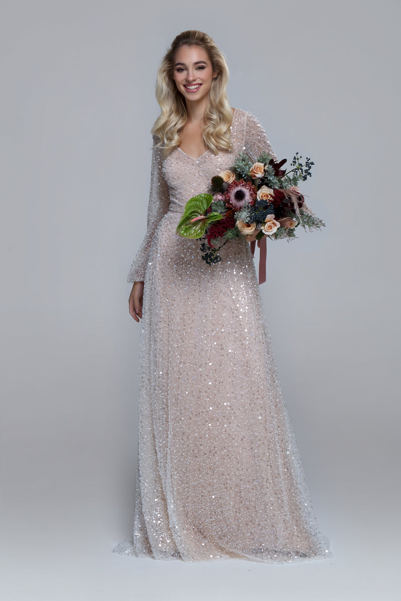 Luxurious wedding dress PASSION. Sequin tulle bridal dress with V-neckline. A-line big volume skirt. 