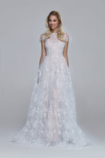 Sparkling wedding dress PEONY. Boat neckline, drop split on the back. Folded skirt.
