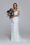 Sparkly wedding dress PERSIA. Boat neckline, V-back. Slip mermaid siluett with train