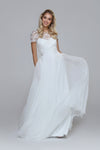 Wedding dress with beaded top and silk chiffon skirt. Boat neckline with V-back.