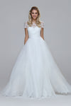 Wedding dress with beaded top and silk chiffon skirt. Boat neckline with V-back.