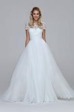 Wedding dress with beaded top and silk chiffon skirt. Boat neckline with V-back.